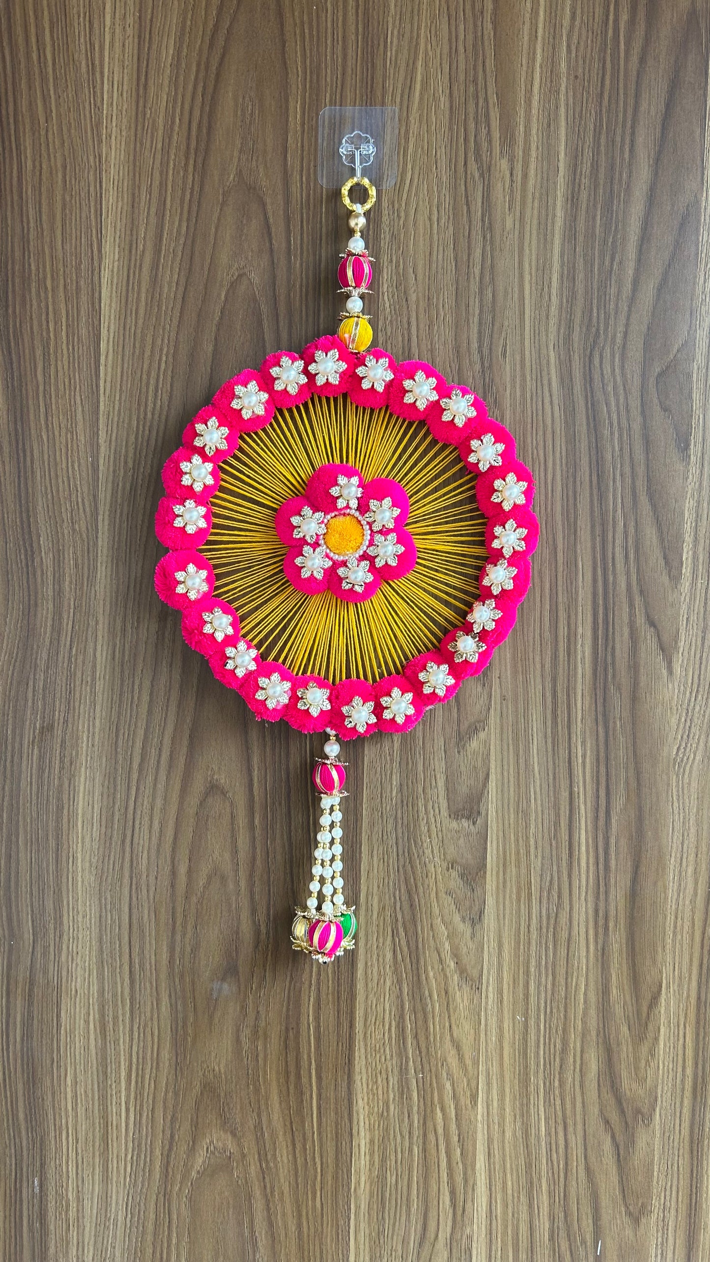 Kalakriti Handcrafted Floral Round Wall Hanging – Pink & Yellow Pom-Pom Decor with Pearl Accents for Home & Festive Decoration