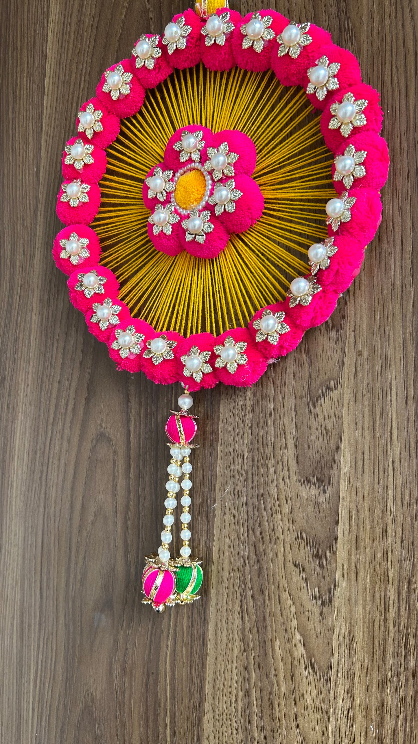Kalakriti Handcrafted Floral Round Wall Hanging – Pink & Yellow Pom-Pom Decor with Pearl Accents for Home & Festive Decoration