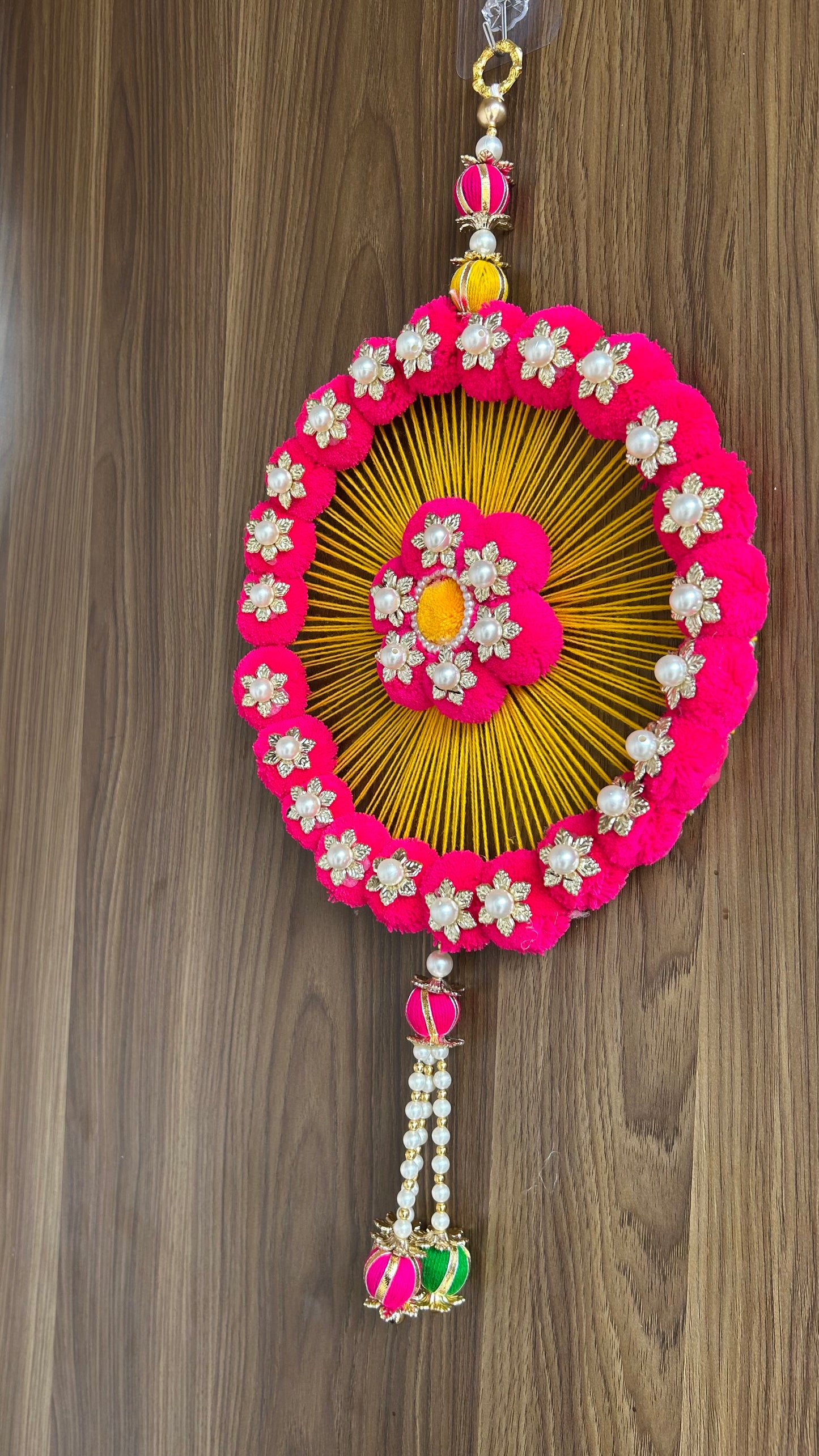 Kalakriti Handcrafted Floral Round Wall Hanging – Pink & Yellow Pom-Pom Decor with Pearl Accents for Home & Festive Decoration