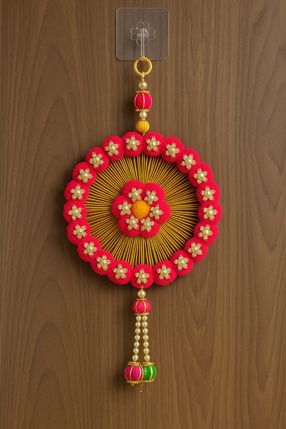 Kalakriti Handcrafted Floral Round Wall Hanging – Pink & Yellow Pom-Pom Decor with Pearl Accents for Home & Festive Decoration