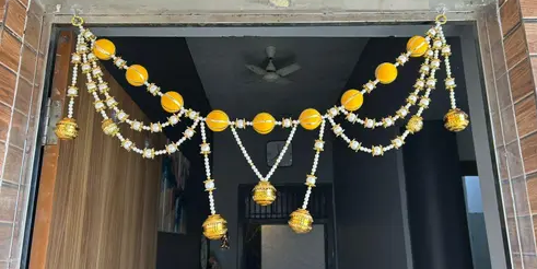 Kalakriti Golden & yellow Beaded Toran with Hanging Bells – Elegant Door/Wall Decoration